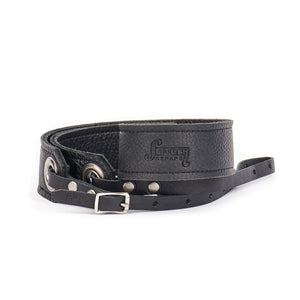 black leather camera strap with brushed nickel grommets showing the Slinger Straps logo