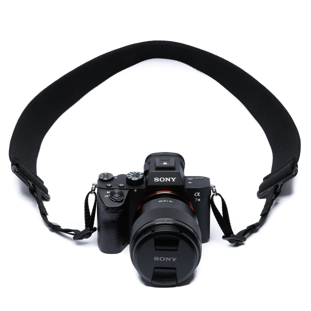 2" wide elastic camera strap attached to a Sony camera 