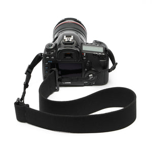 2" wide elastic camera strap attached to a Canon camera