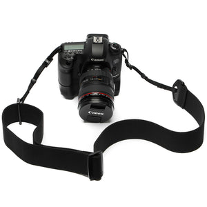 front view of camera strap made of 2" wide heavy-duty elastic material attached to a Canon camera with battery grip