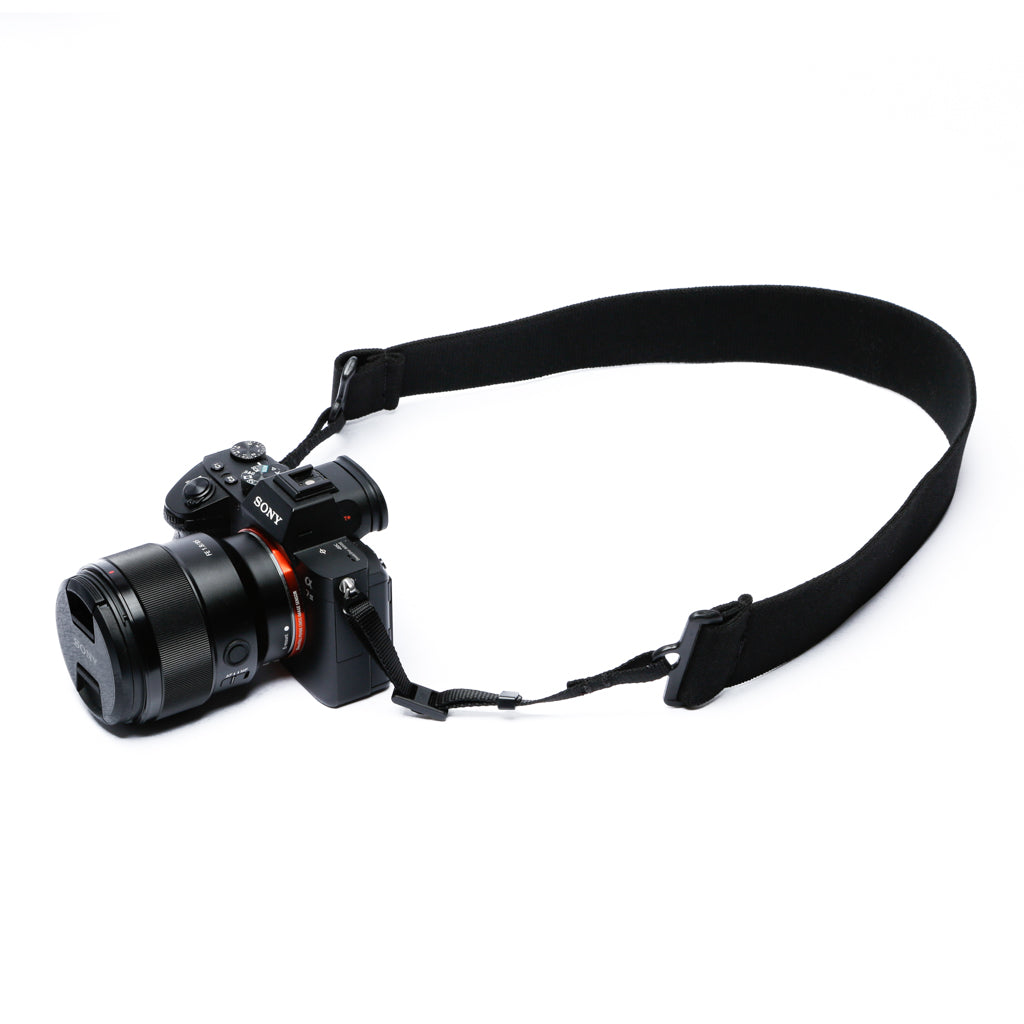Camera strap made of 2" wide heavy-duty elastic with Sony camera attached